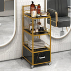 Carrello da salone a 3 ripiani con struttura in metallo dorato, cassetto e ruote bloccabili – Nero/Bianco